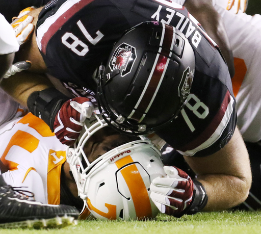 South Carolina offensive lineman Zack Bailey knocks down Tennessee's Darrin Kirkland Jr. during first-quarter action in Columbia, S.C. on Saturday, Oct. 27, 2018. (Travis Bell/SIDELINE CAROLINA)