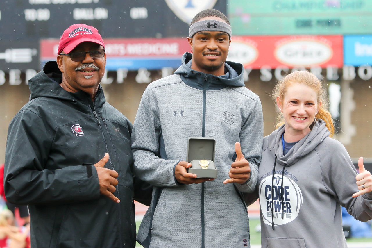 Quincy Hall celebrates his 400mH championship at the 125th Penn Relays | Photo by Charles Revelle | April 26, 2019