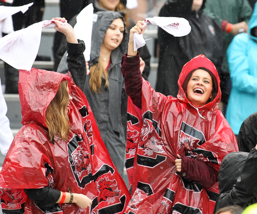 Gamecock fans celebrate in the rain vs. Akron | Dec. 1, 2018 | Photo by Travis Bell