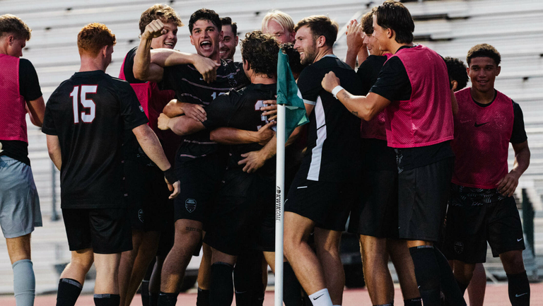 Men's soccer goal celebration