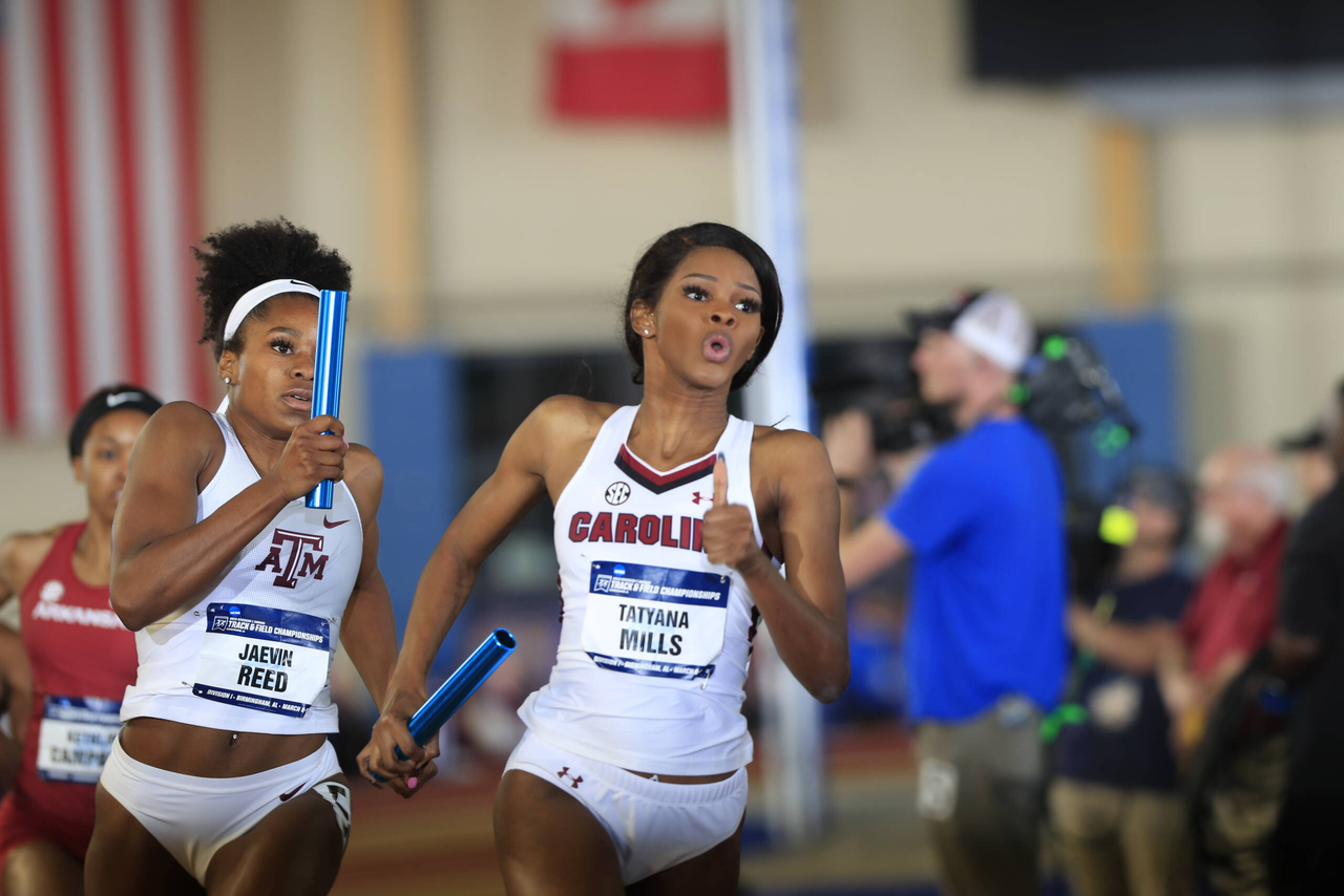 Tatyana Mills carries the stick as part of Carolina's 4x400m relay national championship | March 9, 2019 | Photo by Walt Middleton