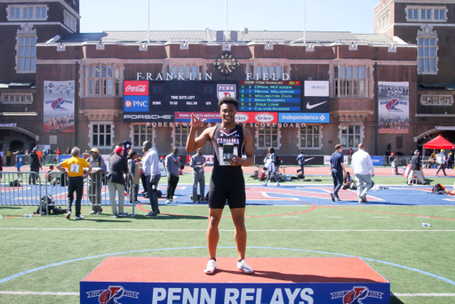 Isaiah Moore celebrates his 110mH championship at the 125th Penn Relays | Photo by Charles Revelle | April 27, 2019