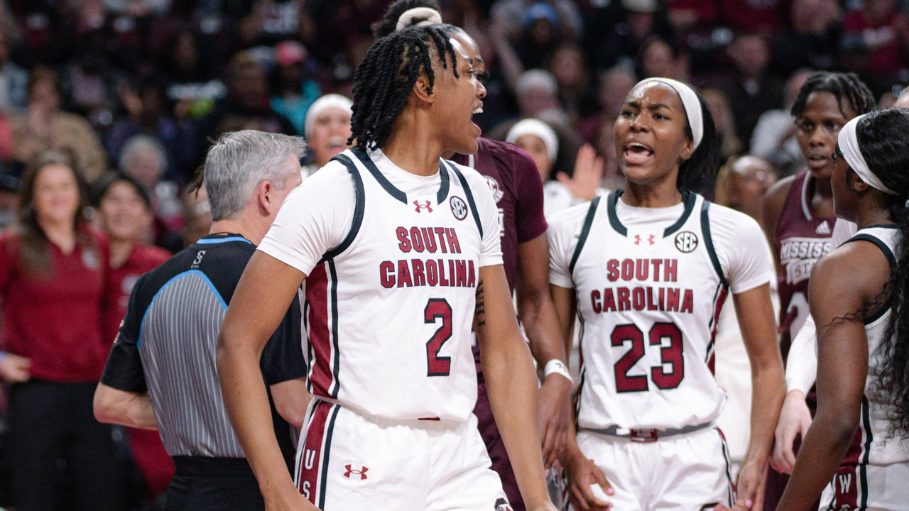 Ashlyn Watkins and Bree Hall celebrate an and-one by Watkins against Mississippi State, 1/7/24