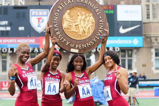 The Gamecocks celebrate their 4x200m relay Championship of America at the 125th Penn Relays | Photo by Charles Revelle | April 26, 2019