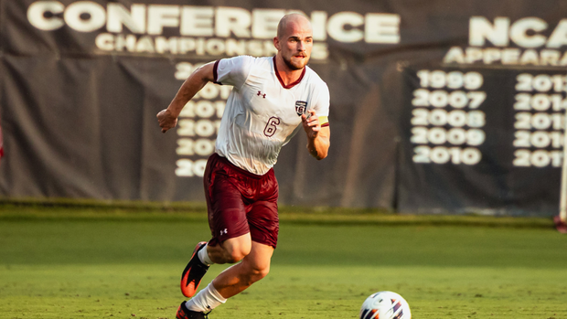 Mika Habel runs up to a ball.