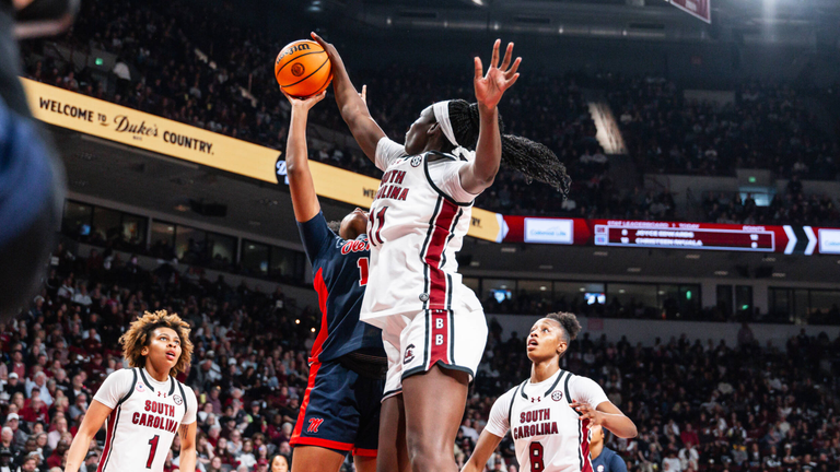 Madina Okot blocks a shot as it comes off the hand of an Ole Miss player.