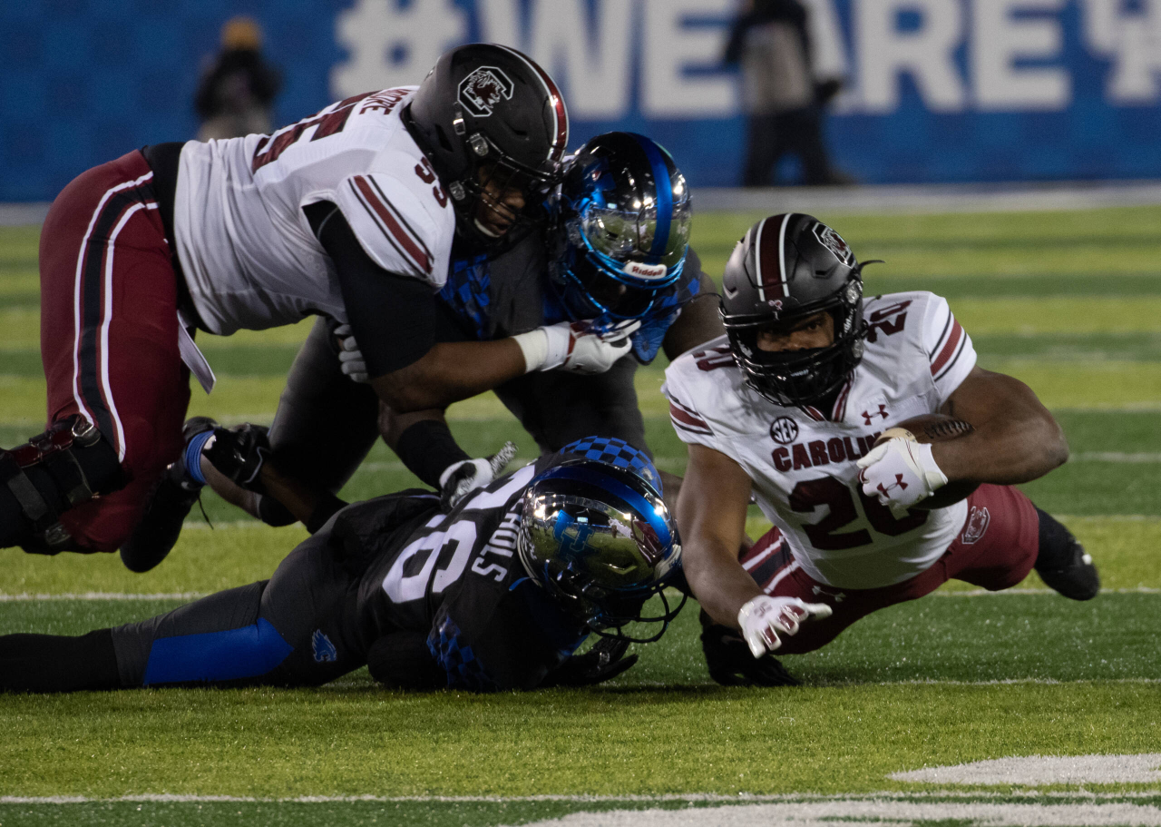 South Carolina Gamecocks running back Kevin Harris (20) tried to bounce for another yard  as Kentucky played South Carolina  on December 5, 2020.  Photo by Mark Cornelison 
