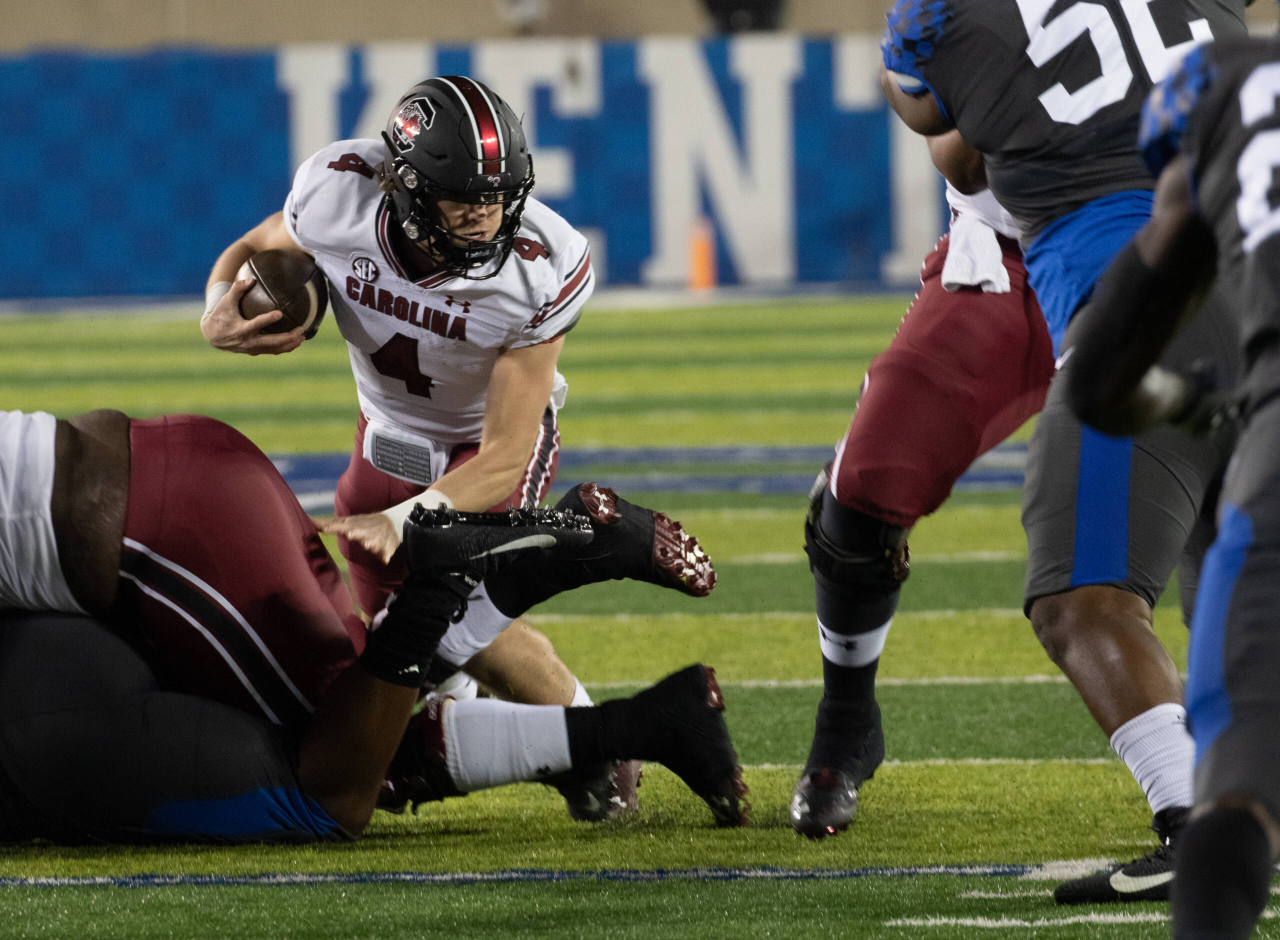 South Carolina Gamecocks quarterback Luke Doty (4) looking for running room,  as Kentucky played South Carolina  on December 5, 2020.  Photo by Mark Cornelison 