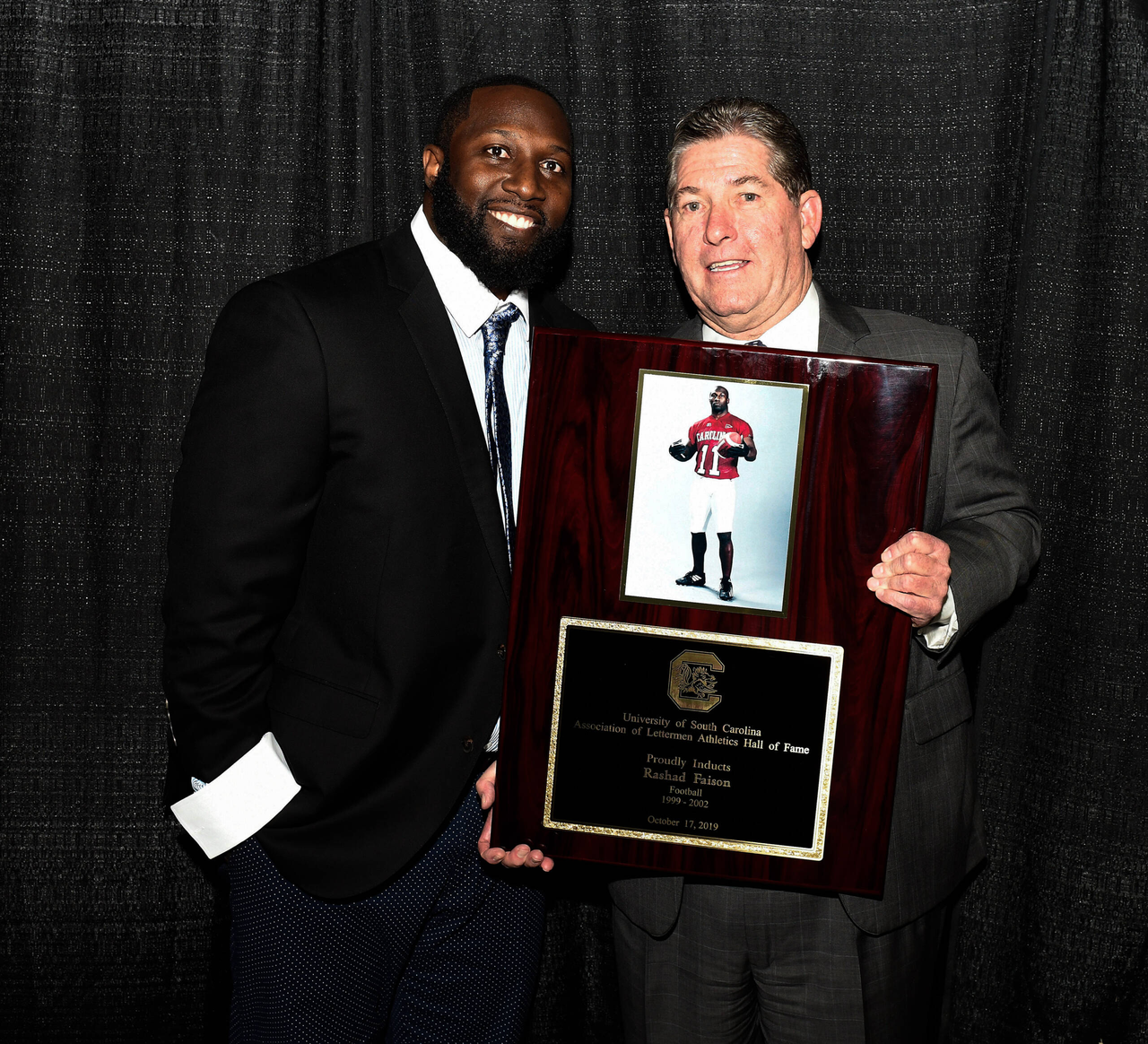 Rashad Faison (Football, 1999-2002) with Athletics Director Ray Tanner | 2019 South Carolina Athletics HOF Induction Ceremony | Thursday, Oct. 17, 2019 | Colonial Life Arena | Columbia, S.C.
