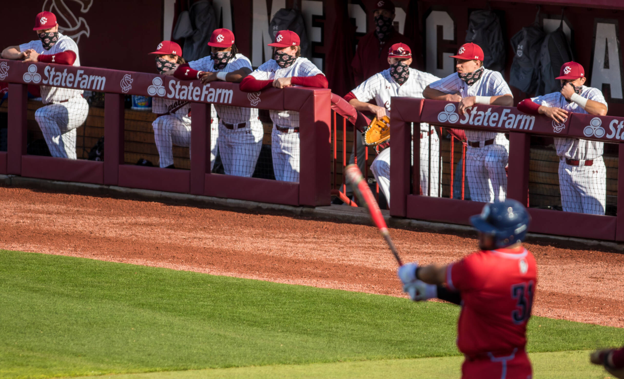 South Carolina Gamecocks players watch the game from the dugout.

South Carolina vs. Dayton Baseball, Feb. 19, 2021, Founders Park, Columbia, SC.

Photo by Jeff Blake