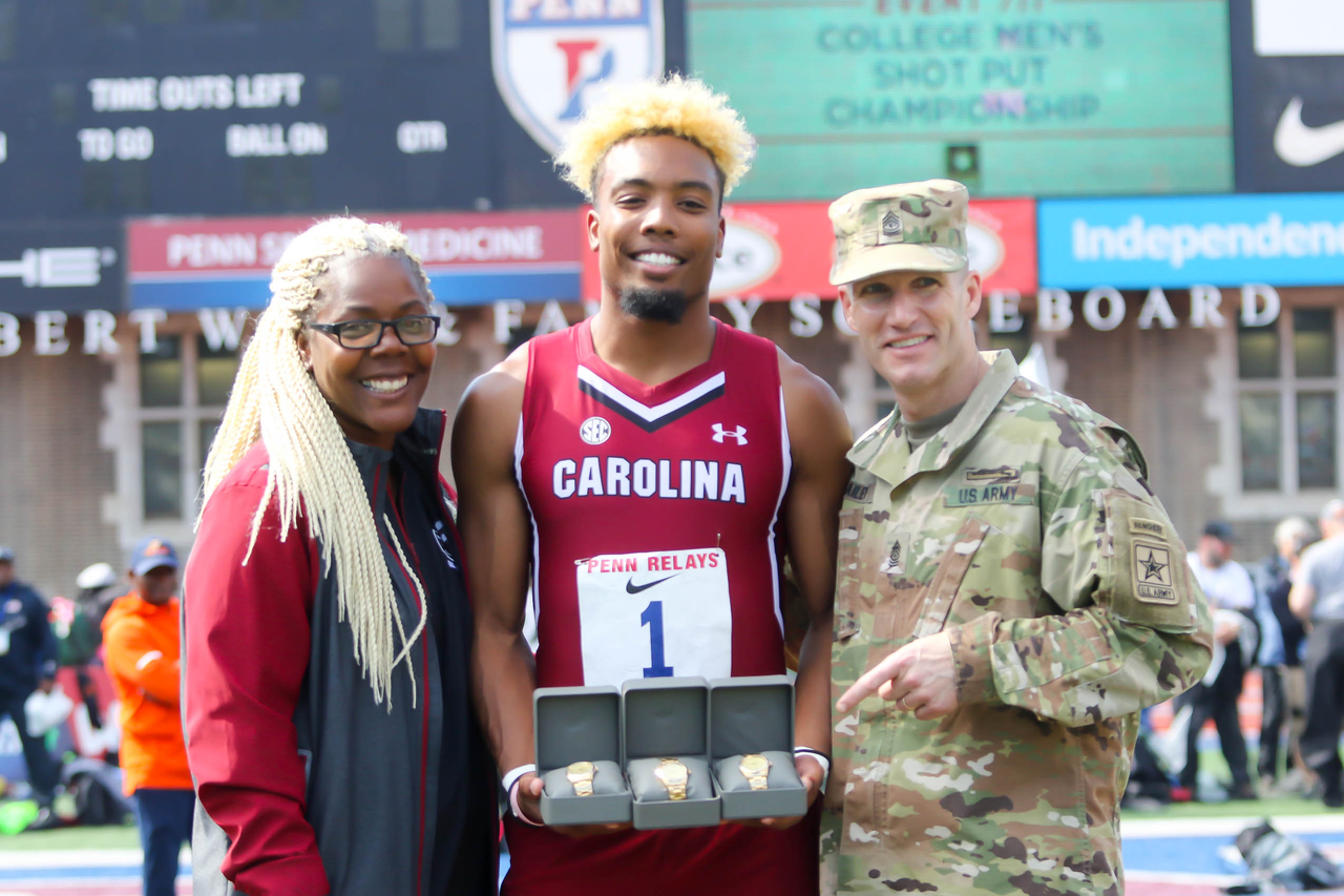 Yann Randrianasolo celebrates his third-straight long jump championship at the 125th Penn Relays | Photo by Charles Revelle | April 26, 2019