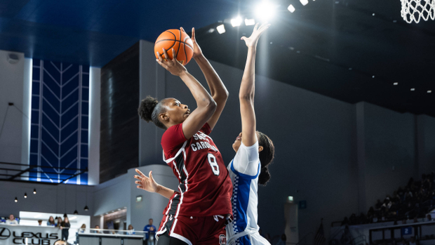 Joyce Edwards rises for a short jump shot against a Kentucky defender.