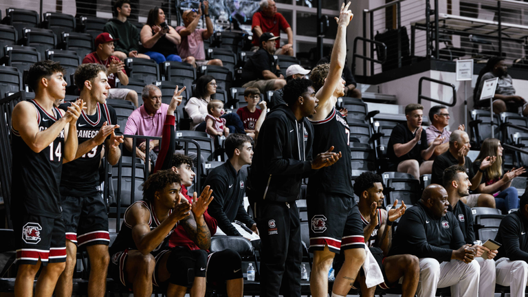 South Carolina bench cheering after the Gamecocks connected on a made three pointer in the exhibition against Wake Forest.