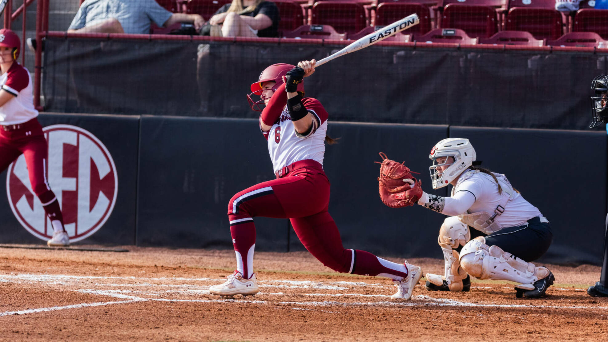 Softball Explodes for 21 runs and Four Home Runs in Victory