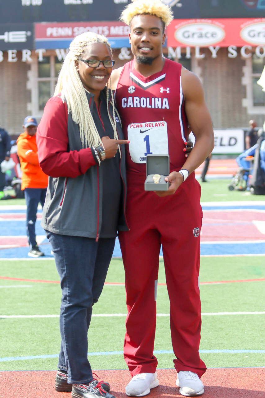 Yann Randrianasolo celebrates his third-straight long jump championship at the 125th Penn Relays | Photo by Charles Revelle | April 26, 2019