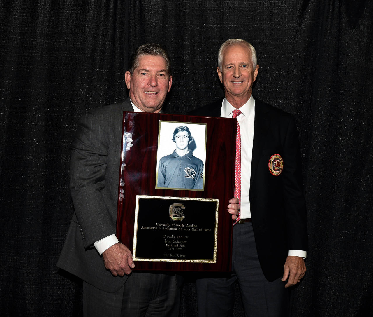 Jim Schaper (Track & Field, 1971-74) with Athletics Director Ray Tanner | 2019 South Carolina Athletics HOF Induction Ceremony | Thursday, Oct. 17, 2019 | Colonial Life Arena | Columbia, S.C.