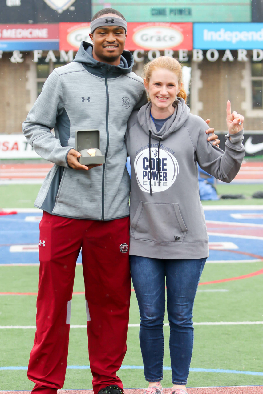 Quincy Hall celebrates his 400mH championship at the 125th Penn Relays | Photo by Charles Revelle | April 26, 2019