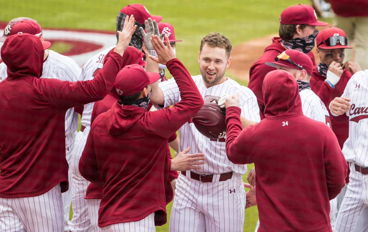 South Carolina Gamecocks outfielder Andrew Eyster (11) celebrates a grand slam during the fourth inning.

South Carolina vs. Dayton Baseball, Feb. 19, 2021, Founders Park, Columbia, SC.

Photo by Jeff Blake