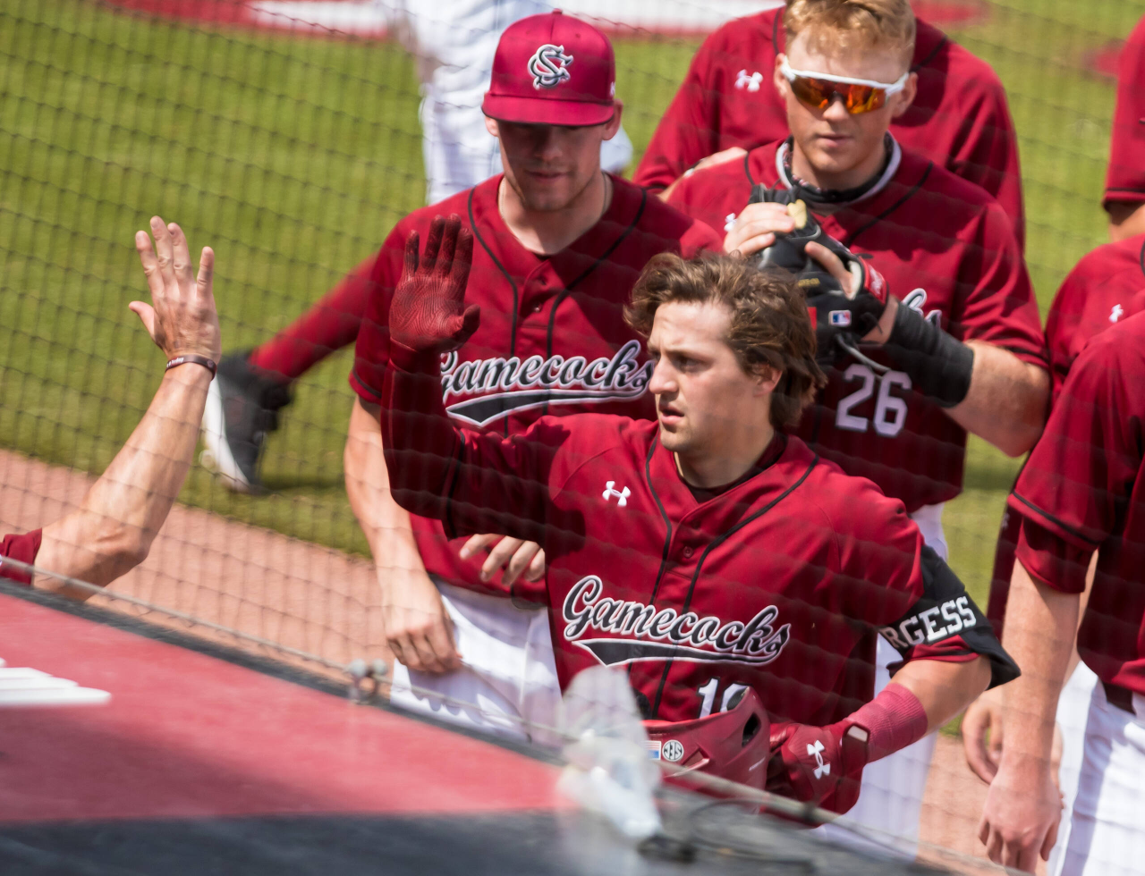 South Carolina Gamecocks catcher Colin Burgess (10) celebrates a home run during the second inning.