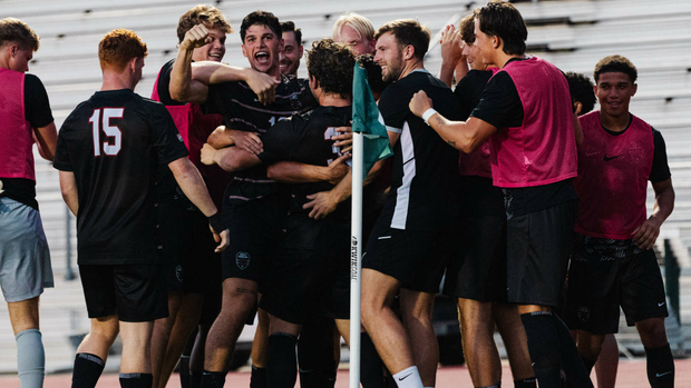Men's soccer goal celebration