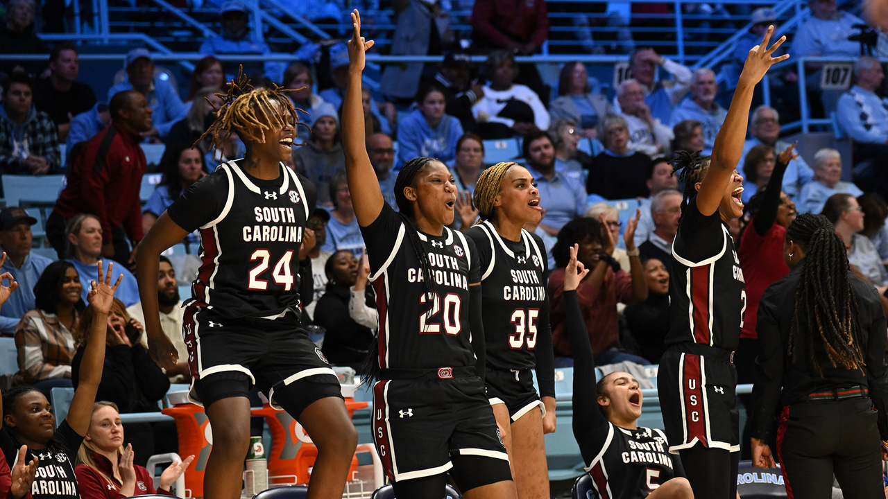 The bench players react to a big play at #24/24 North Carolina, 11/30/24
