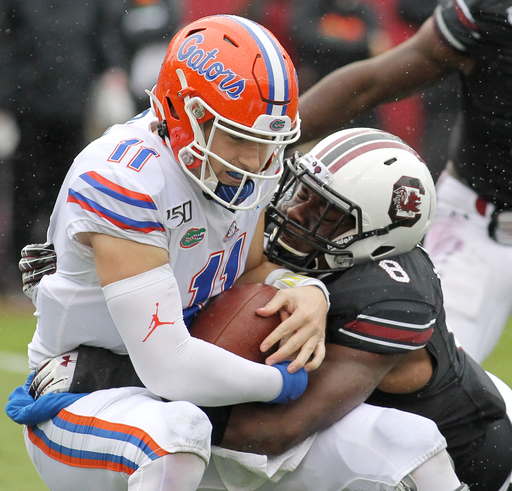 South Carolina linebacker D.J. Wonnum (8) sacks Florida quarterback Kyle Trask (11) during second-quarter action in Columbia, S.C. on Saturday, Oct. 19, 2019. (Travis Bell/SIDELINE CAROLINA)