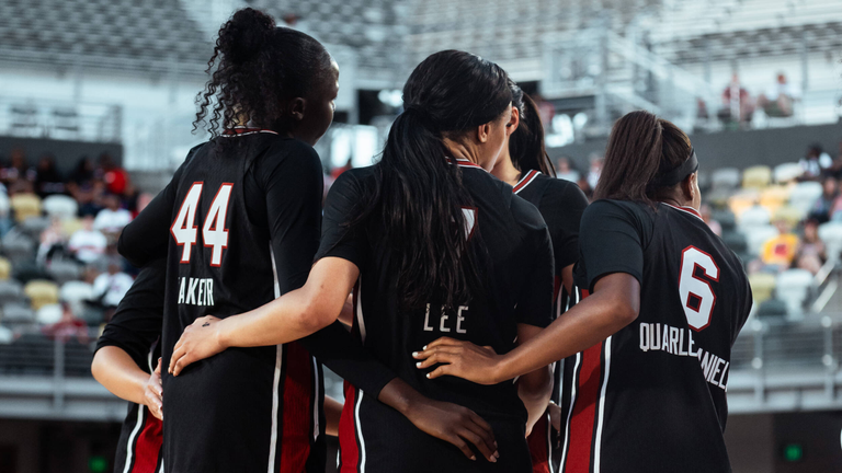 South Carolina players huddle on the court between plays.