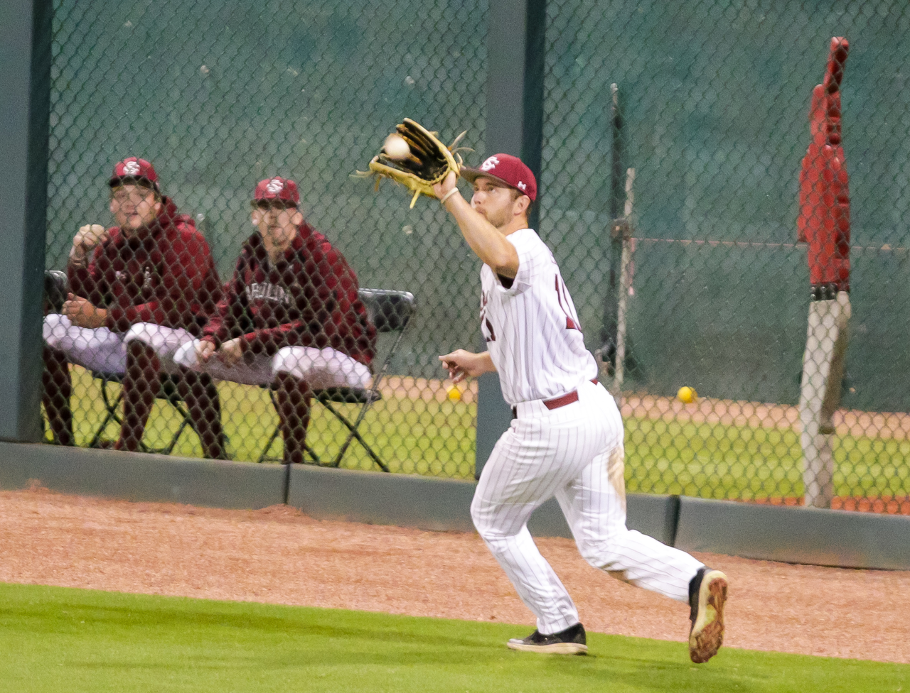 South Carolina Gamecocks outfielder Andrew Eyster (11) makes a catch against the Arkansas Razorbacks.