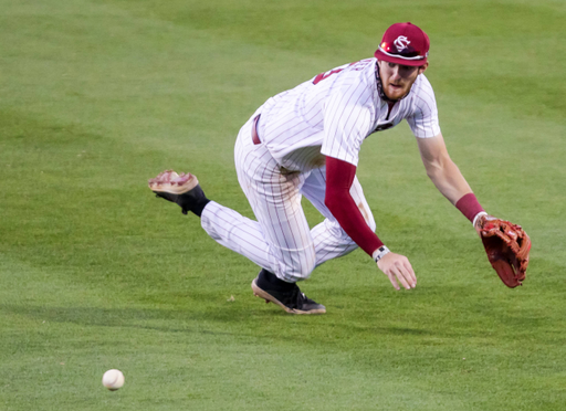 South Carolina Gamecocks second baseman Braylen Wimmer (3) makes a sliding stop on a grounder against the Arkansas Razorbacks.