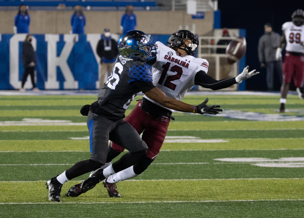 Kentucky Wildcats wide receiver DeMarcus Harris (86) tried to pull in a Terry Wilson pass but South Carolina Gamecocks defensive back Joey Hunter (12)  broke the play up  as Kentucky played South Carolina  on December 5, 2020.  Photo by Mark Cornelison 