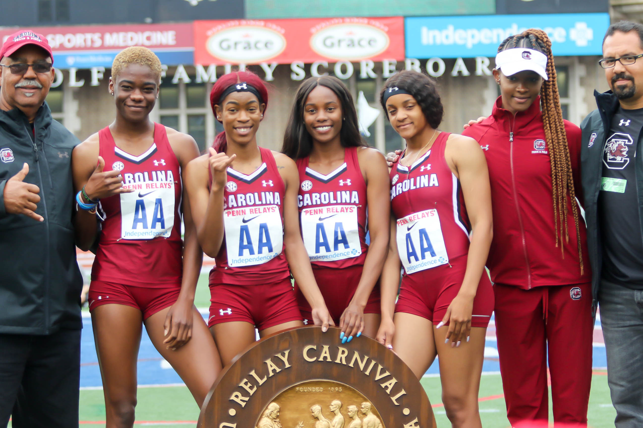 The Gamecocks celebrate their 4x200m relay Championship of America at the 125th Penn Relays | Photo by Charles Revelle | April 26, 2019