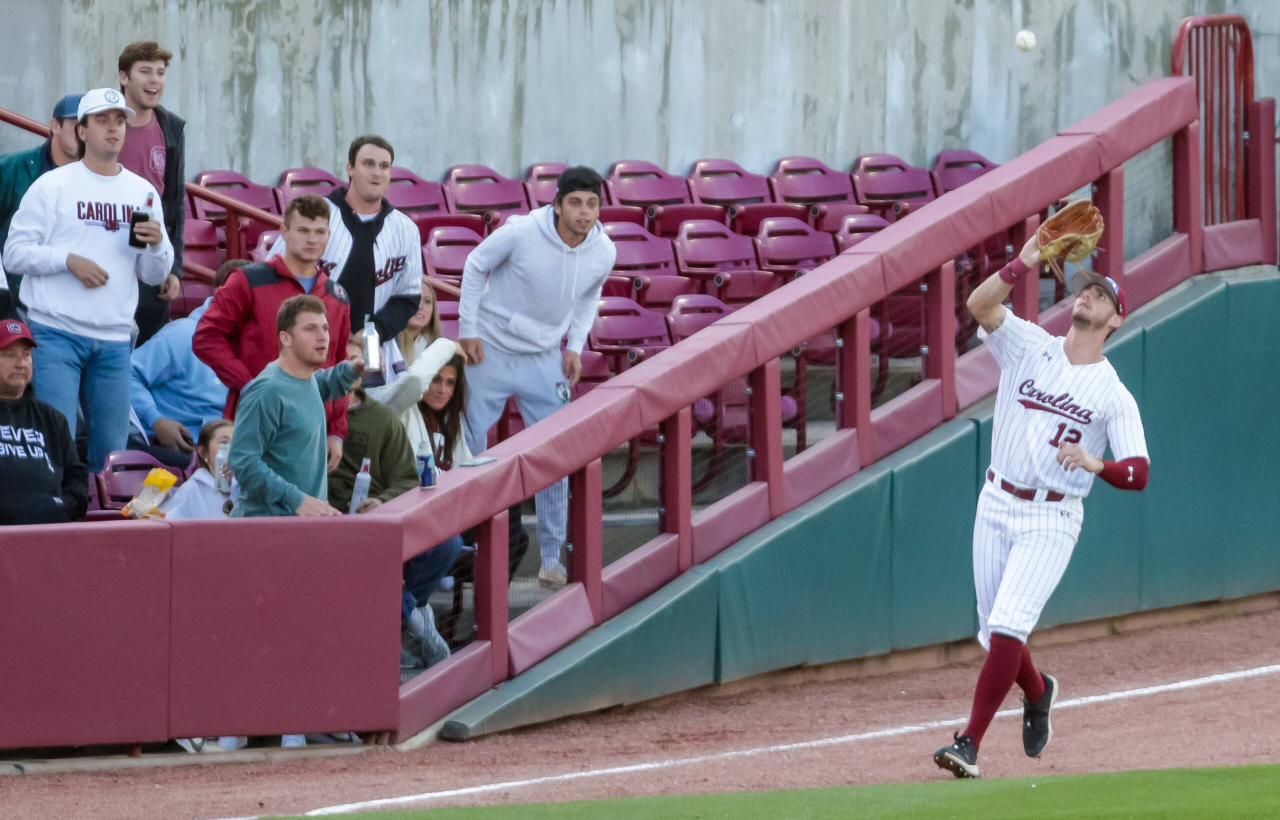 South Carolina Gamecocks outfielder Josiah Sightler (12) makes a catch against the Arkansas Razorbacks.