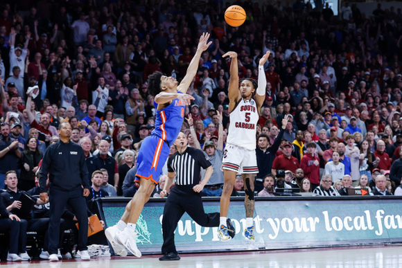 Johnson's 3-pointer lifts No. 18 South Carolina to 82-76 comeback victory over No. 24 Florida