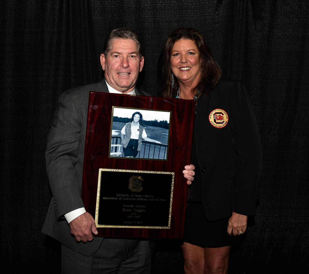 Kristi Coggins (Women's Golf, 1994-2007) with Athletics Director Ray Tanner | 2019 South Carolina Athletics HOF Induction Ceremony | Thursday, Oct. 17, 2019 | Colonial Life Arena | Columbia, S.C.