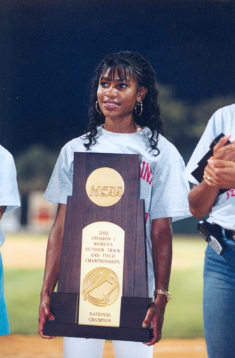 Shevon Stoddart with the 2002 NCAA Championship Team Trophy