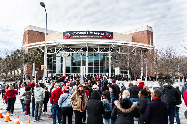Fans wait in long lines in front of Colonial Life Arena waiting to get into a South Carolina women's basketball game.