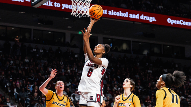 Joyce Edwards rises for a short jump shot in the lane over three Missouri defenders.
