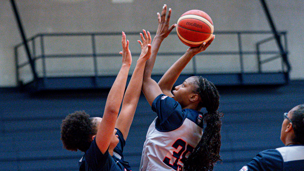 Joyce Edwards holds off a defender while going up for a shot in the lane during U.S. trials for the 2024 FIBA AmeriCup Team.