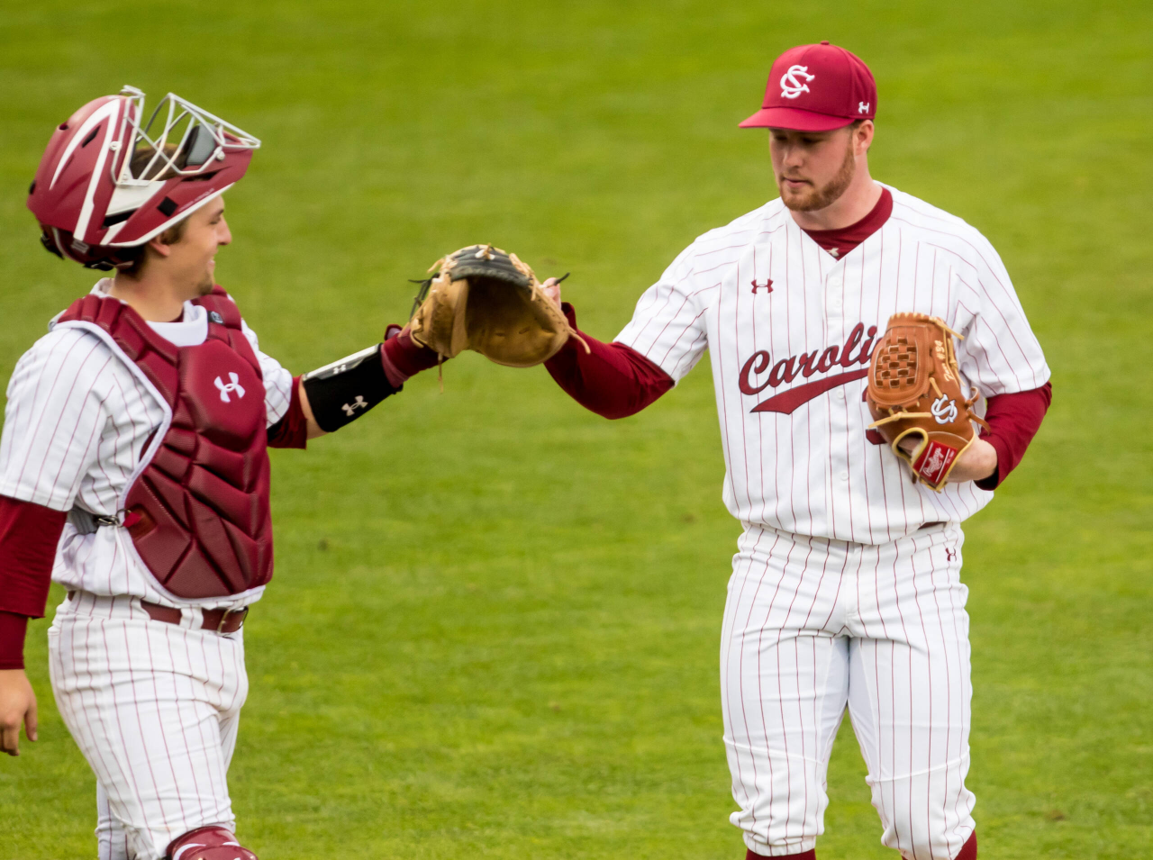 South Carolina Gamecocks Thomas Farr (34) and South Carolina Gamecocks catcher Colin Burgess (10) celebrate scoreless third inning.

South Carolina vs. Dayton Baseball, Feb. 19, 2021, Founders Park, Columbia, SC.

Photo by Jeff Blake