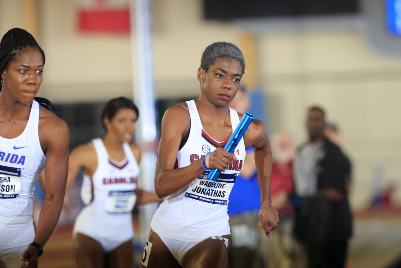 Wadeline Jonathas carries the stick as part of Carolina's 4x400m relay national championship | March 9, 2019 | Photo by Walt Middleton