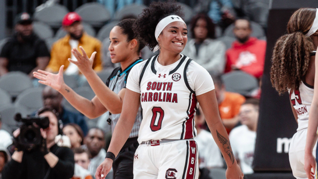 Te-Hina Paopao smiles at the bench during a break in play against Michigan, 11/4/24