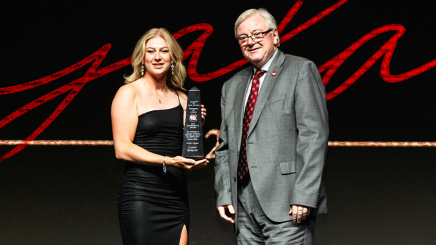Louise Rydqvist accepts the President's Award from University President Michael Amiridis at the 2025 Gamecock Gala.