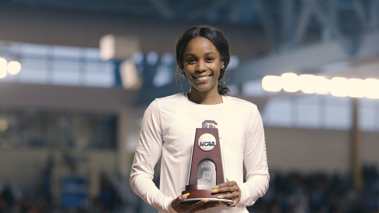 Aliyah Abrams celebrates a second-place finish in the 400m at the 2019 NCAA Indoor Championships | March 9, 2019 | Photo by Shannon Murphy