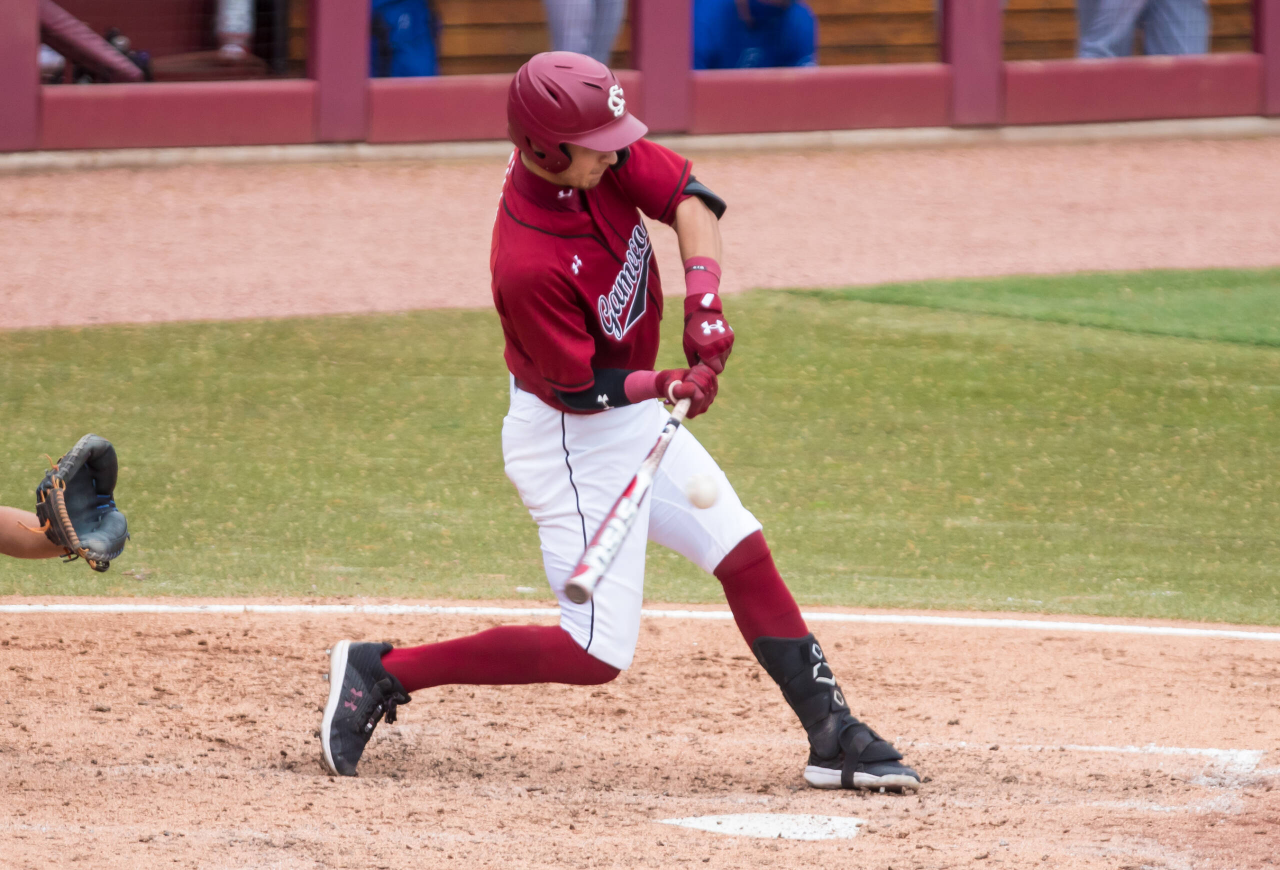 South Carolina Gamecocks shortstop George Callil (6) hits an RBI double against the Florida Gators.