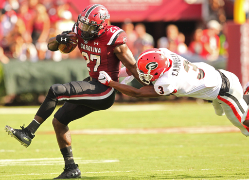 South Carolina's Ty'Son Williams tries to get away from Georgia's Tyson Campbell during second-quarter action in Columbia, S.C. on Saturday, Sept. 8, 2018. (Travis Bell/SIDELINE CAROLINA)