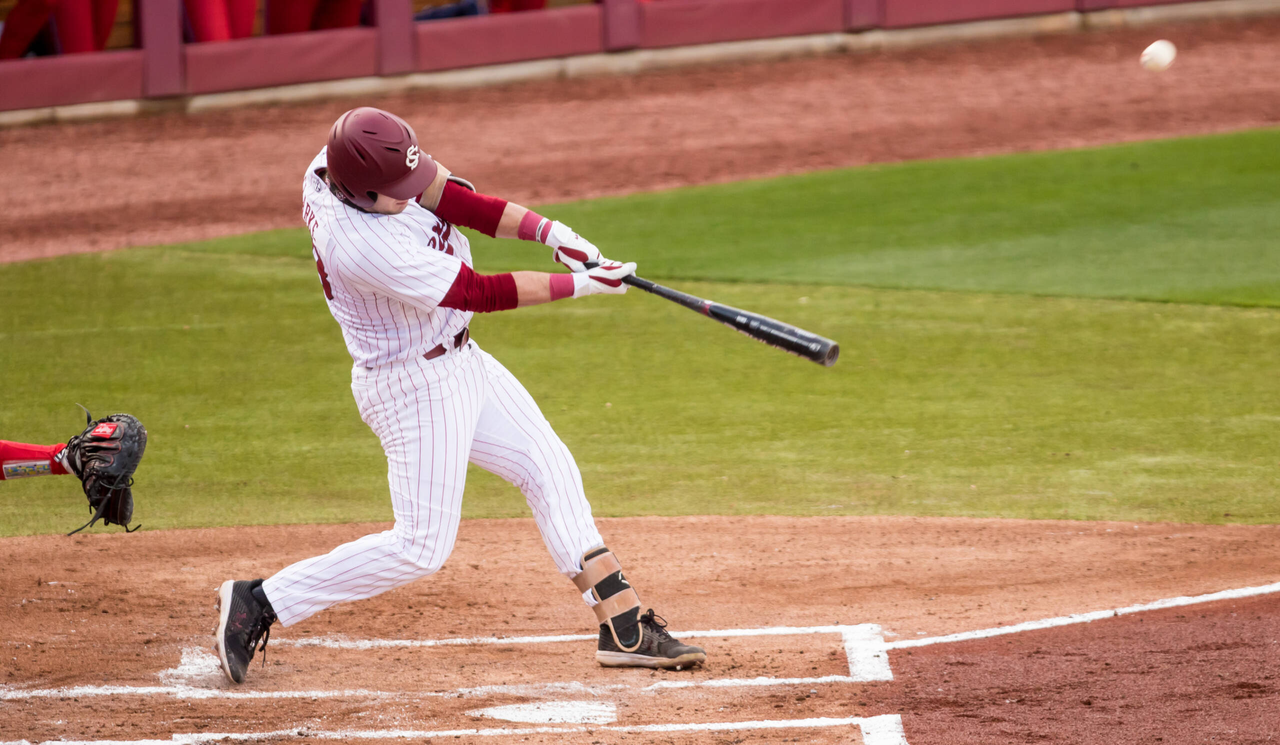 South Carolina Gamecocks Wes Clarke (28) hits a 3-run-homer during the first inning.

South Carolina vs. Dayton Baseball, Feb. 19, 2021, Founders Park, Columbia, SC.

Photo by Jeff Blake