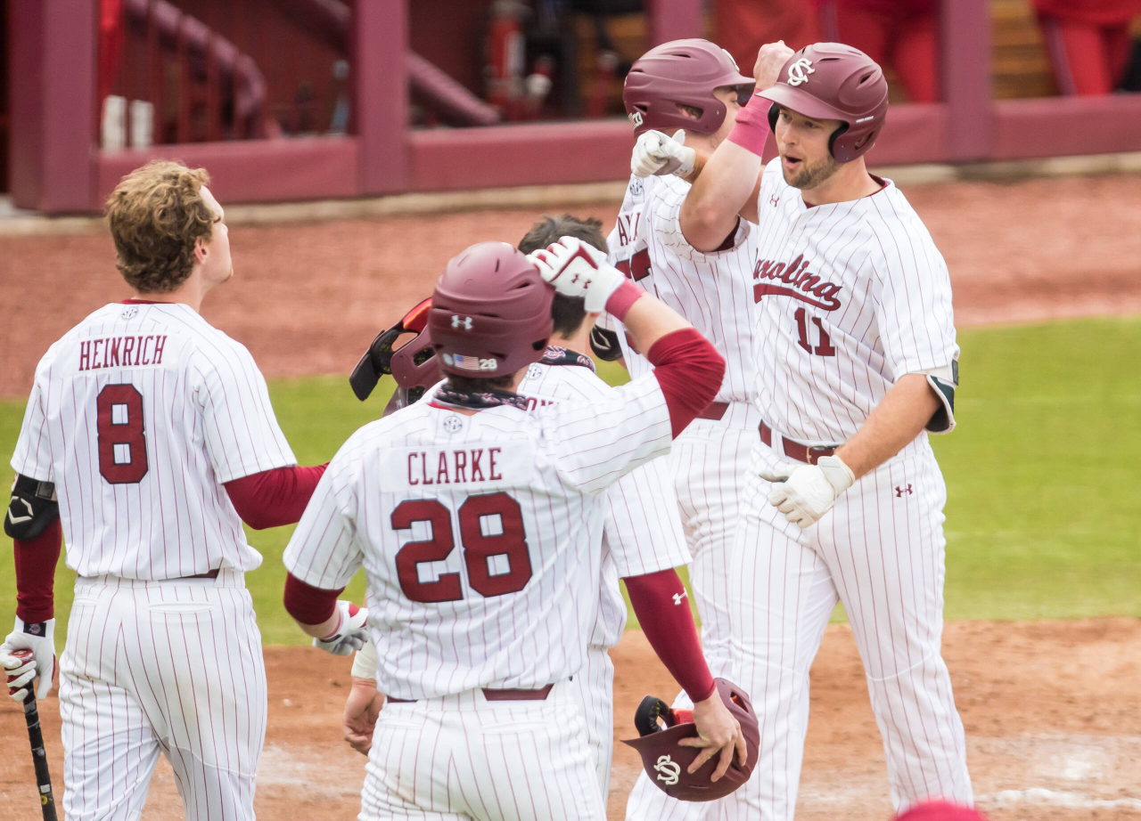 South Carolina Gamecocks outfielder Andrew Eyster (11) celebrates a grand slam during the fourth inning.

South Carolina vs. Dayton Baseball, Feb. 19, 2021, Founders Park, Columbia, SC.

Photo by Jeff Blake