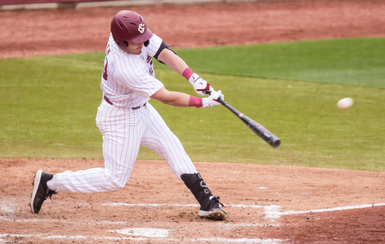 South Carolina Gamecocks outfielder Brady Allen (33) hits a double during the fourth inning.

South Carolina vs. Dayton Baseball, Feb. 19, 2021, Founders Park, Columbia, SC.

Photo by Jeff Blake
