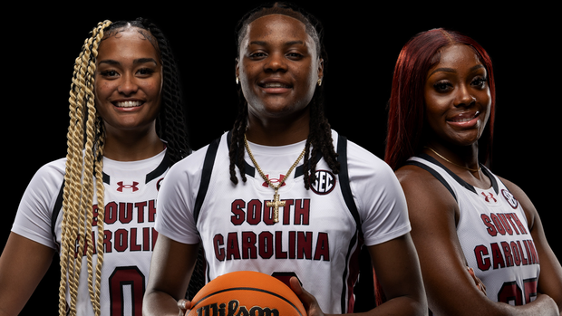 Guards Te-Hina Paopao, MiLaysia Fulwiley and Raven Johnson posed in white uniforms.