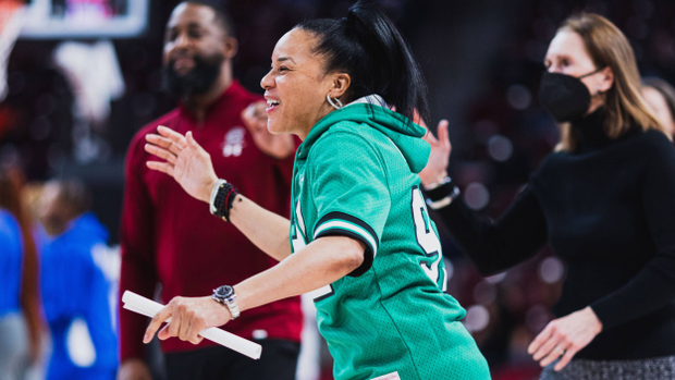 Dawn Staley smiling before starting lineups vs. Kentucky, 2/2/23